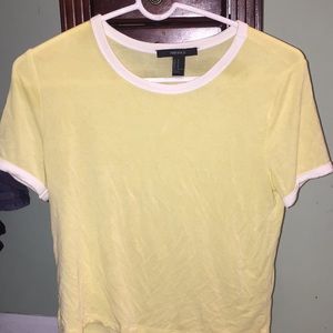 I’m selling a light yellow shirt